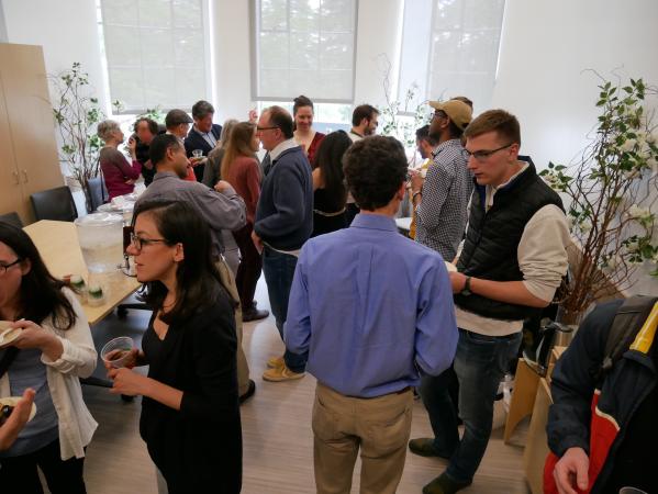 NELC conference room full of students, faculty and staff at the reception